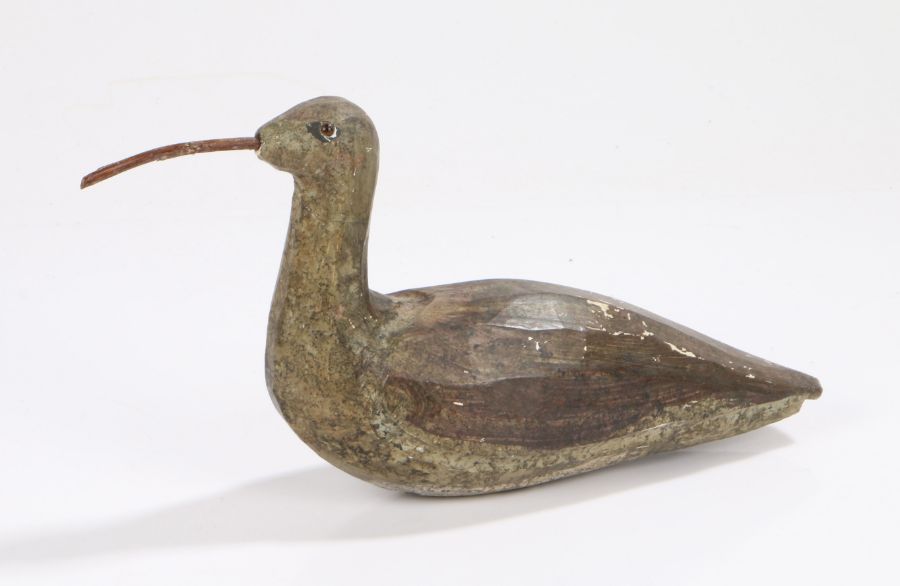 Early 20th Century Shorebird decoy, the painted body with angled back set with coloured eyes and