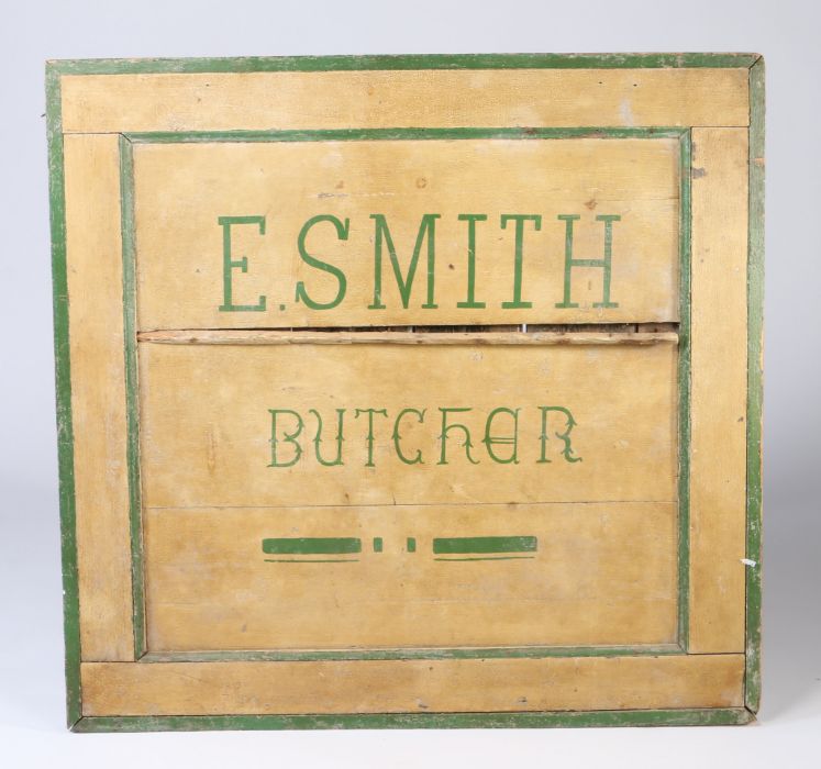 A large, completely original 19th Century butcher’s shop hand-painted wooden trade sign, in yellow &
