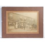 Large original late Victorian / Edwardian sepia photograph of a butchers’ shop situated amongst a