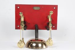 Superb and rare late 19th Century polished brass and steel servant’s or prison bell call system,
