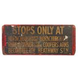 An early 20th century plywood transport sign, printed with 'STOPS ONLY AT HORNCHURCH...etc' double-