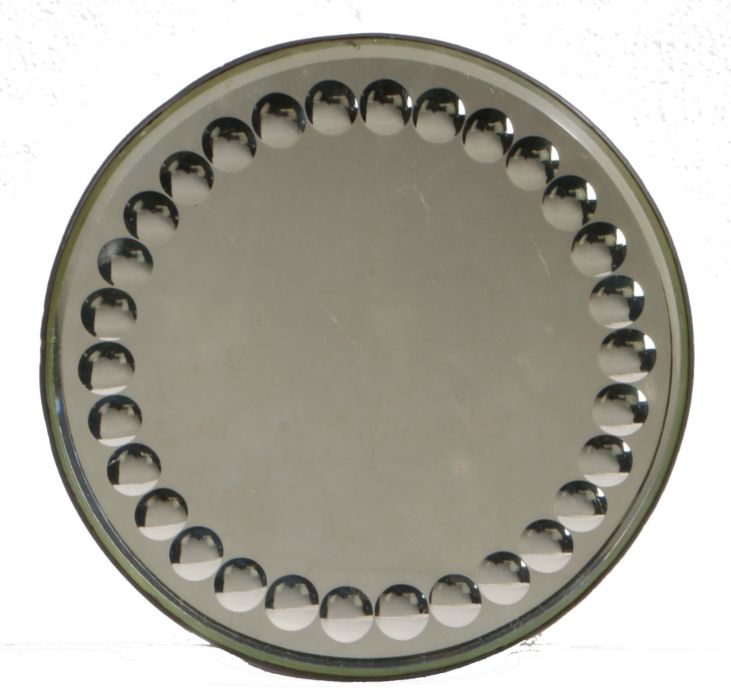 A late 19th/early 20th century Sorcerer's mirror, circular form with border of thirty small convex