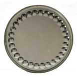 A late 19th/early 20th century Sorcerer's mirror, circular form with border of thirty small convex