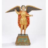 A 17th/18th century Continental polychrome painted carved wooden angel, modelled with wings & arms