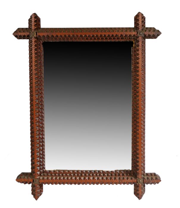 A 19th century Tramp Art rectangular mirror, the typical carved geometric frame of cruciform design,