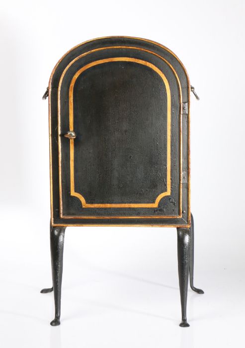 Rare George III toleware plate warmer, circa 1820, the arched top above a hinged door enclosing