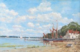 John Sutton (British, Born 1935) 'Barges at Low Tide, Pin Mill, Suffolk'