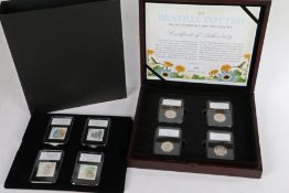 The Beatrix Potter United Kingdom Stamp and Coin Set, to include four stamps and four 50 pence