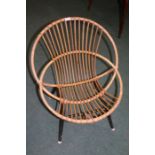 20th century wicker tub chair raised on a black metal frame, 73cm high