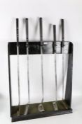 Five ping putters to include a left handed example, on a display stand (5)