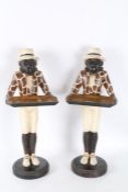 Pair of novelty dumbwaiters, in the form of monkeys in costume 56cm tall (2)