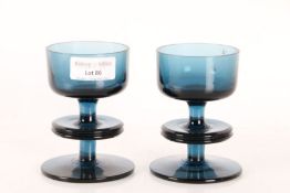 A pair mid 20th century Sheringham pattern blue glass candle holders designed by Ronald Stennett
