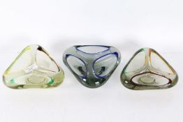 Three mid to late 20th century Murano style art glass ash trays, all with various colour glass