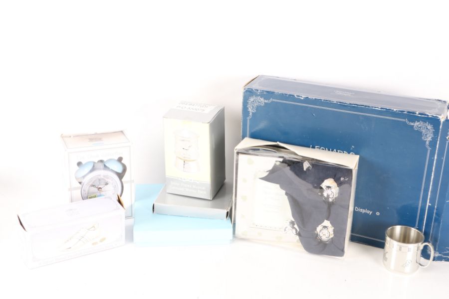 Collection of Christening related items, to include silver plated carousel money box, set of three