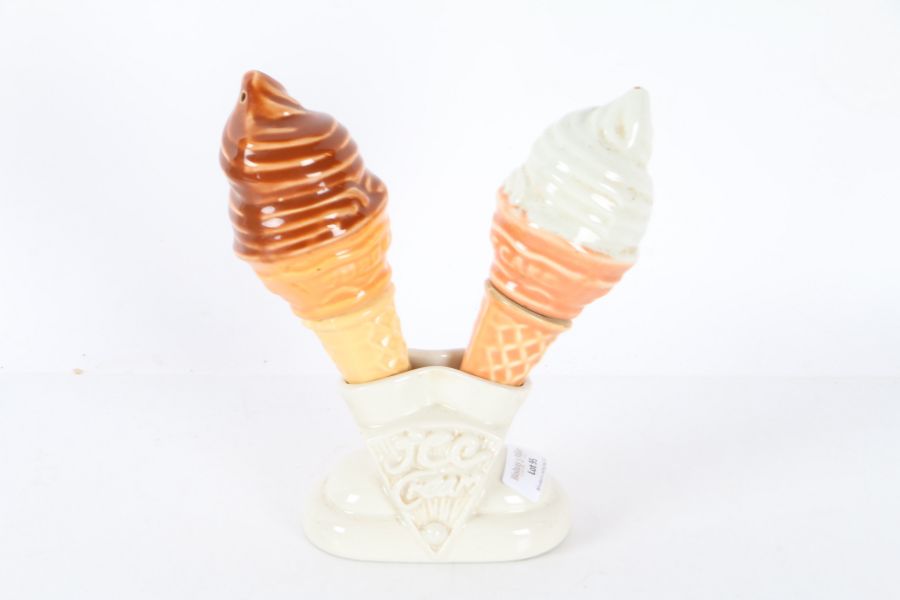 An unusual 20th century salt and pepper seller in the form of ice cream cones, 19cm high