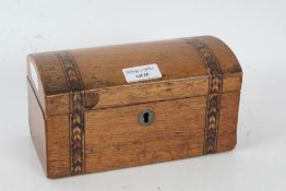 A 20th century parquetry inlaid domed box, with a domed lid decorated with inlaid, 20cm wide