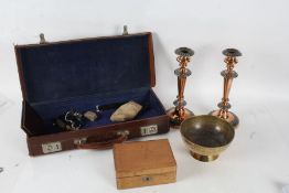 A collection of works of art to include a leather case, pair of copper candle sticks, brass bowl etc