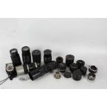 A good collection of various camera lenses to include a Vivitar 85-205mm 1:3.8 lens, Prakticar MC