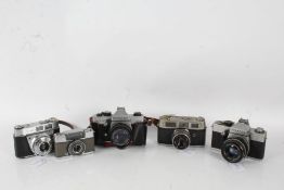 Five 20th century cameras and lenses to include a Praktica Super TL2 with a Pentacon auto 1.8/50