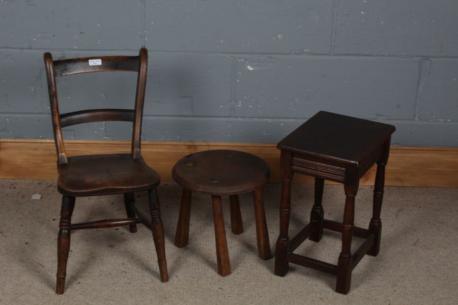 A 19th century elm seated child's chair together with a Victorian oak milking stool and a further