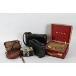 Cine Kodak model 2 with case together with a Kodak Brownie Cresta 3 camera with case, Bush