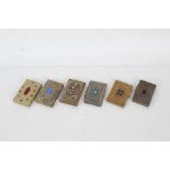 Five 20th century brass card cases together with an Aide memoir all set with various stones and