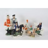 A collection of Staffordshire figures to include, Dick Turpin, Tom King, Hayelock, A large figure