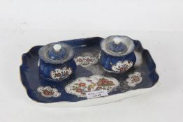 Bloch and Co, porcelain desk stand, with twin inkwells and stand, decorated exotic bird and flowers,