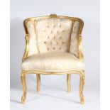 Continental gilt wood armchair, the button back with sweeping arms above a serpentine seat and