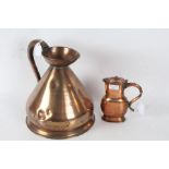 An unusual 19th century copper jug of slender proportions with a heart decorated to the end of the