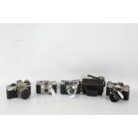 Five 20th century cameras and lenses to include a Praktica LB, a Zenit E No73211672 with a Helios-