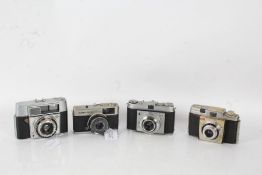 Four 20th century cameras and lenses to include a Kodak Retinette 959379 with a Schneider-