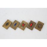 Five 20th century brass card cases all set with various stones and decorated with embossed floral