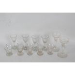 Five 19th century glass custard cups, together with four 19th century port glasses, and a pair of