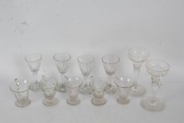 Five 19th century glass custard cups, together with four 19th century port glasses, and a pair of