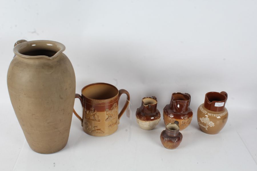 A Collection of Doulton Lambeth and other Stoneware items to include a Doulton Lambeth jug, Cadburys