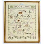 Modern needlework sampler, depicting Scotland, housed in a gilt and glazed frame, 40cm wide, 47.