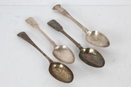 Four George IV and later silver dessert spoons, to include a kings patter example, two with fiddle