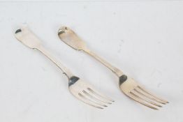 Two William IV silver table forks, the first London 1830, maker William Theobolds, the fiddle patter