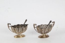 Pair of Victorian silver salts, Birmingham 1896, maker Henry Matthews, with pierced scrolled handles