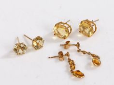 Two pairs of 9 carat gold earrings together with a further unmarked pair, one pair set with amber