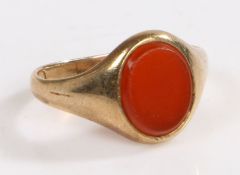 A 9 carat gold and carnelian ring, the head set with a oval carnelian stone, weight 3.5 grams