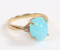 A 9 carat gold, diamond and hemimorphite ring, the head set with a claw mounted cabochon cut