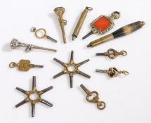 Pocket watch keys and accessories to include gilt foliate engraved key with vacant carnelian seal
