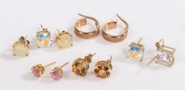 Five pairs of 9 carat gold earrings together with one 9 carat gold earring, some set with