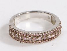 9 carat white gold and diamond ring, with three rows of pink coated diamonds, ring size N weight 3.8