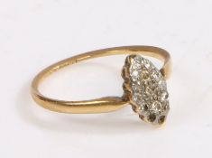 A yellow metal and diamond ring, marks partially rubbed, the head in the form of a diamond set