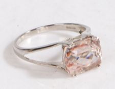 A 9 carat white gold and morganite ring, the head set with a claw mounted morganite stone, ring size