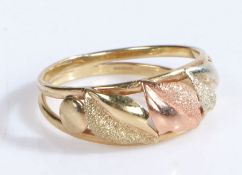 A 9 carat gold ring, the head with a tri colour design, ring size P weight 2.2 grams