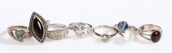 Seven silver and white metal rings, some set with paste etc, weight 22.8 grams